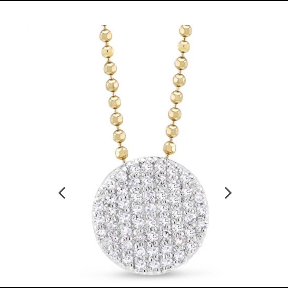 Phillips House 14k yellow gold diamond pendant.